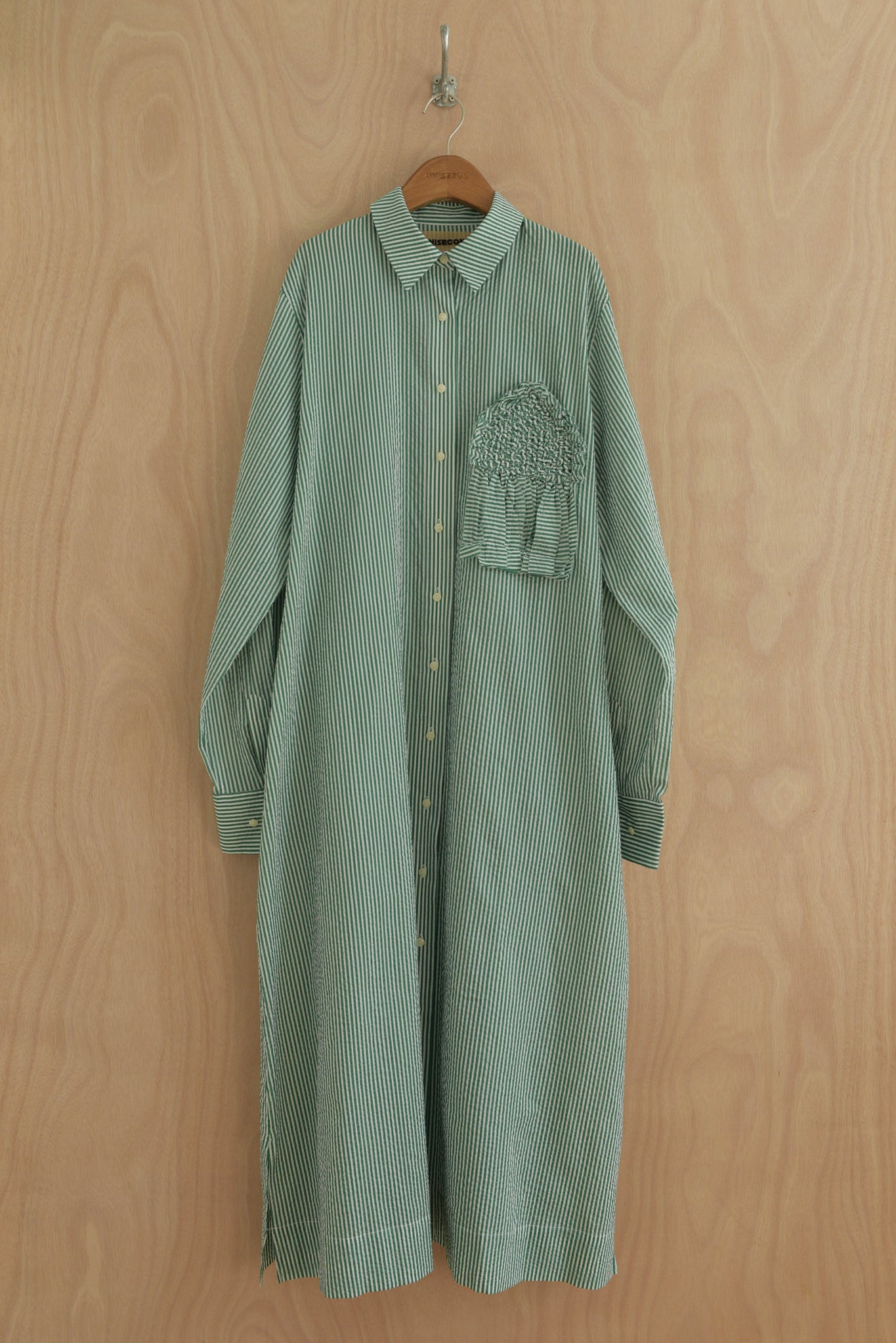 Kali Dress front view in green and white Japanese organic cotton with smocked pocket