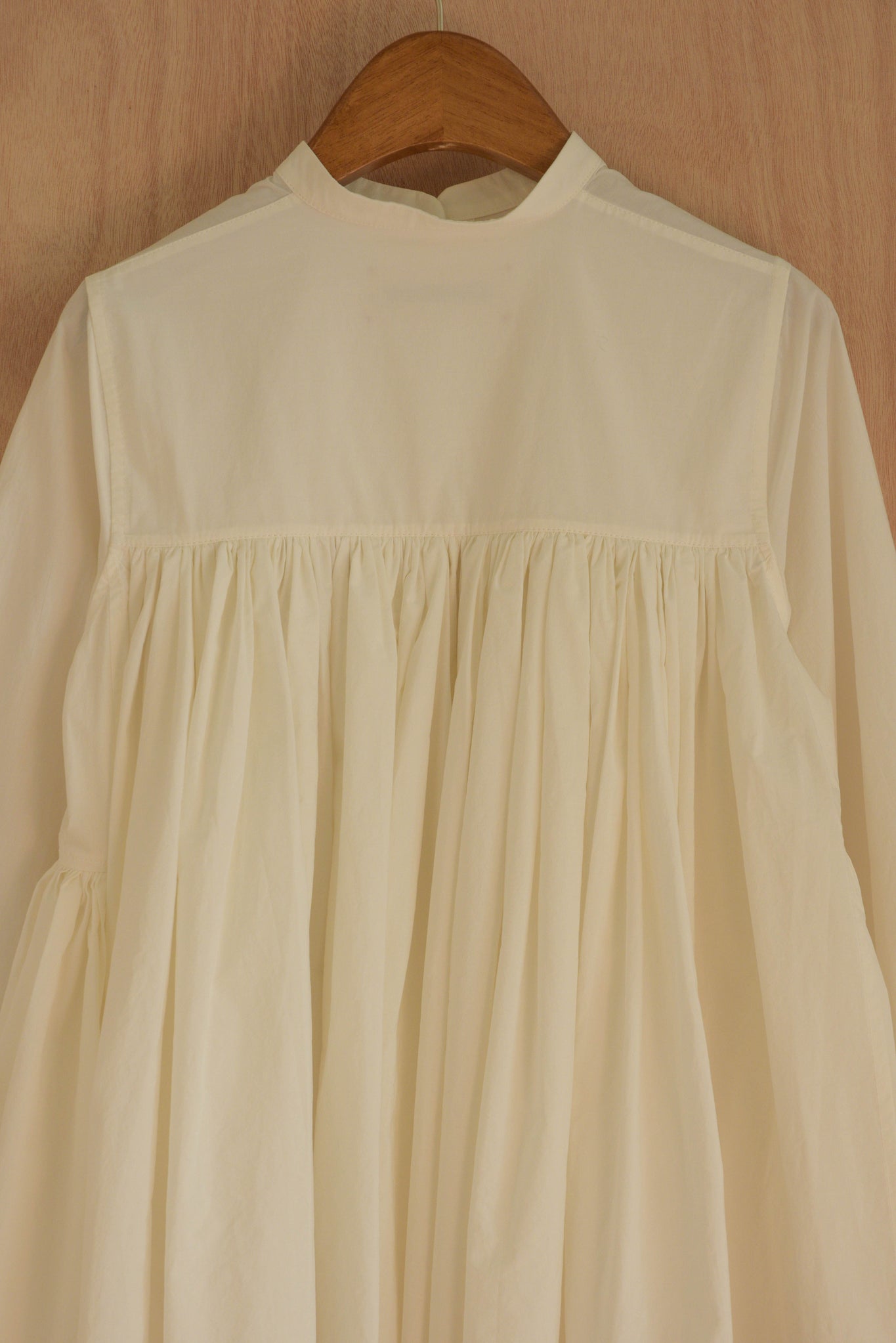 Textured organic cotton fabric in white with subtle structure