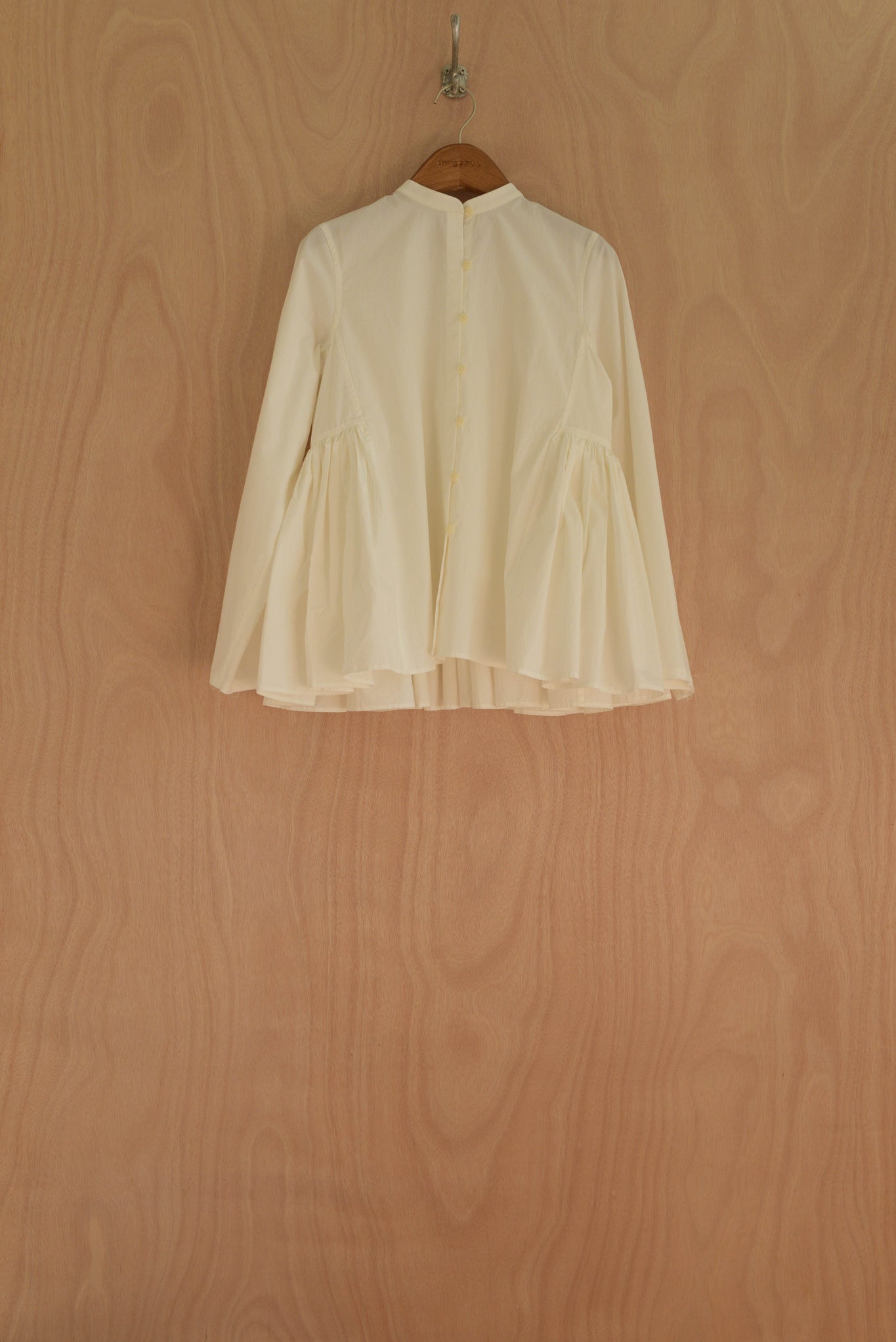 Myra Top front view in white Chinese organic cotton with sculpted volume sleeves