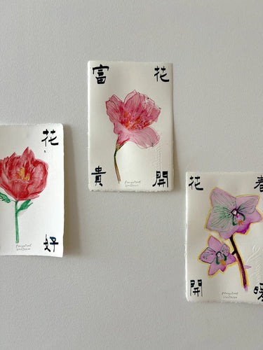 Three hand-painted postcards featuring delicate floral illustrations with Chinese calligraphy, created by artist Penny Peng for the Brush & Blossoms workshop at UNISECON.