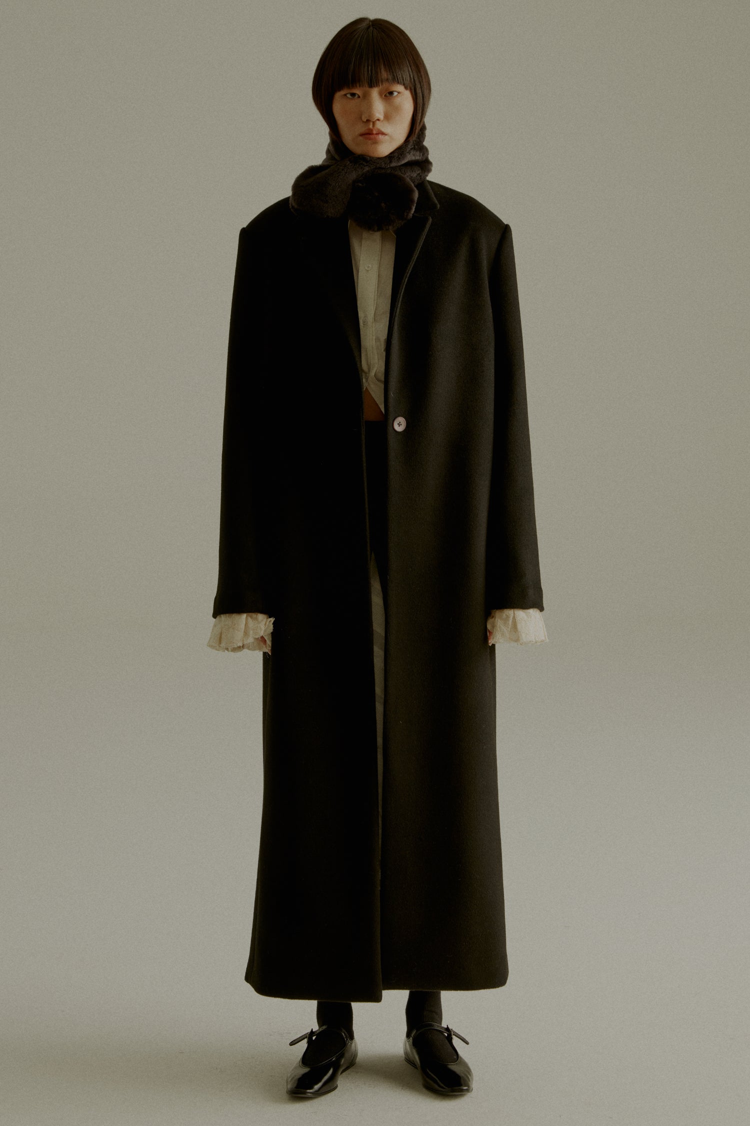 UNISECON AW23 CHARLIE COAT - Super Fine Wool, Long Black Coat, Laced Cuffs - front full