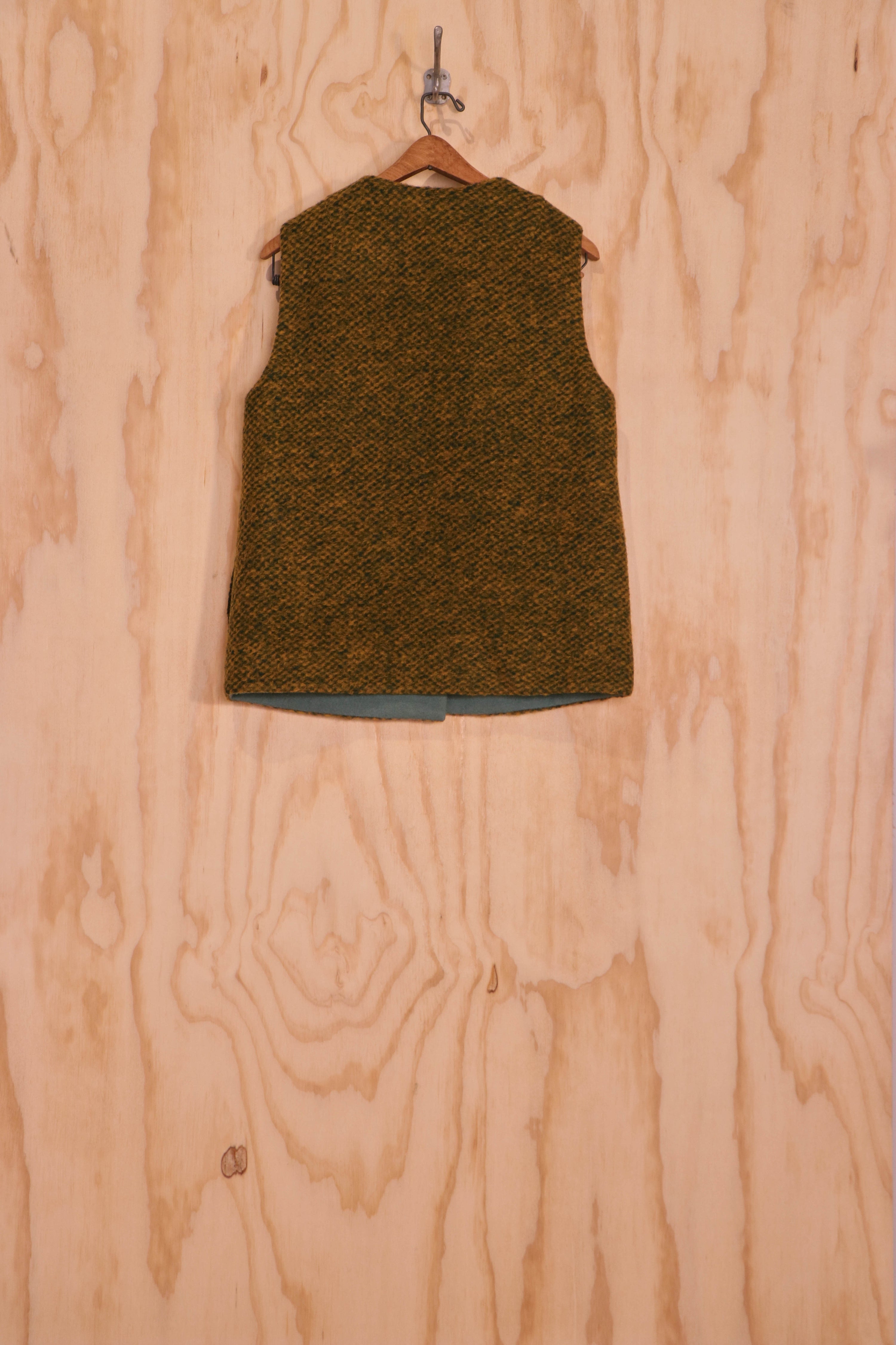 Back view of Mira Vest in olive loop-pile mohair