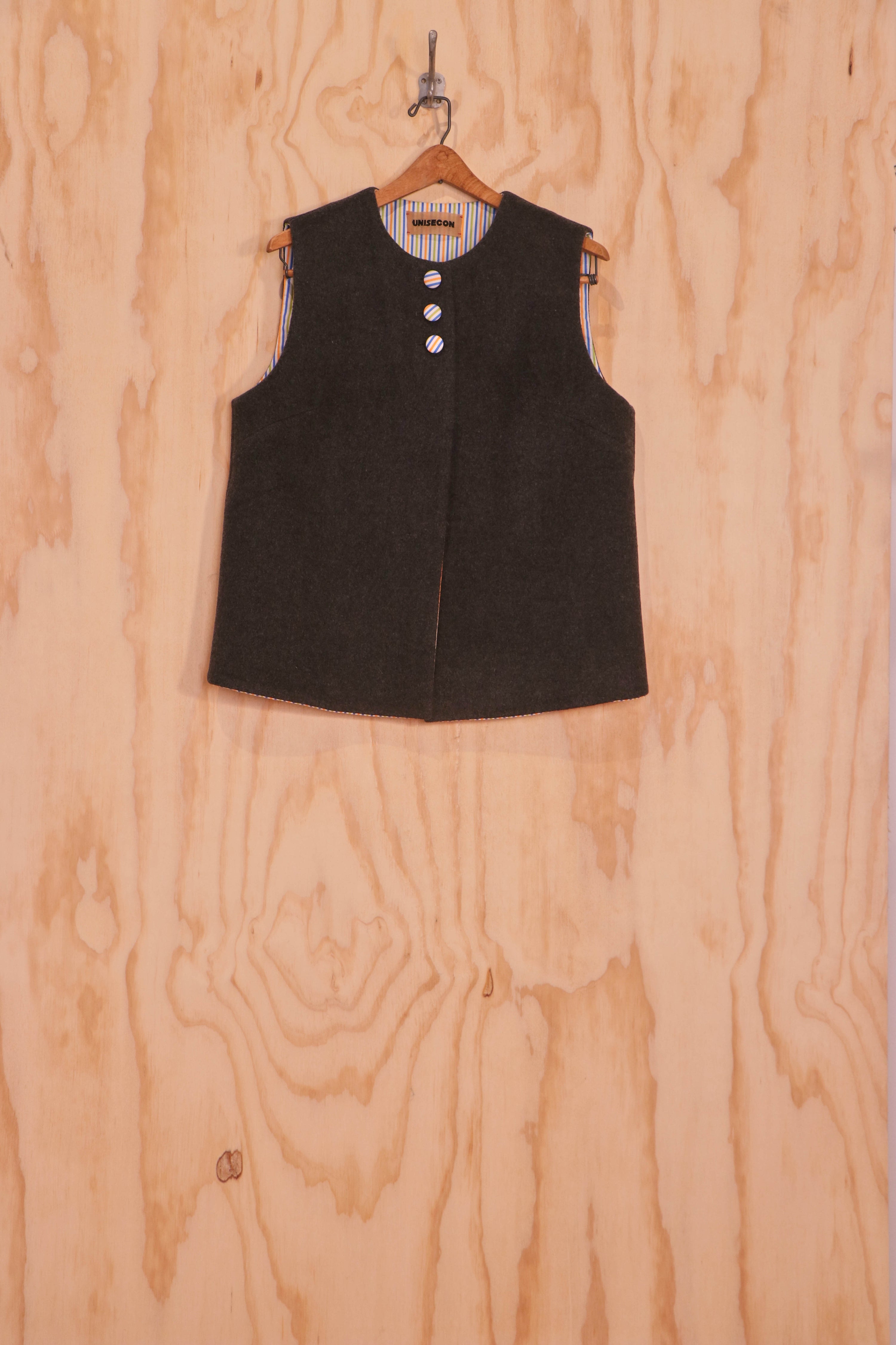 Front view of Mira Vest, wool face, three-button closure