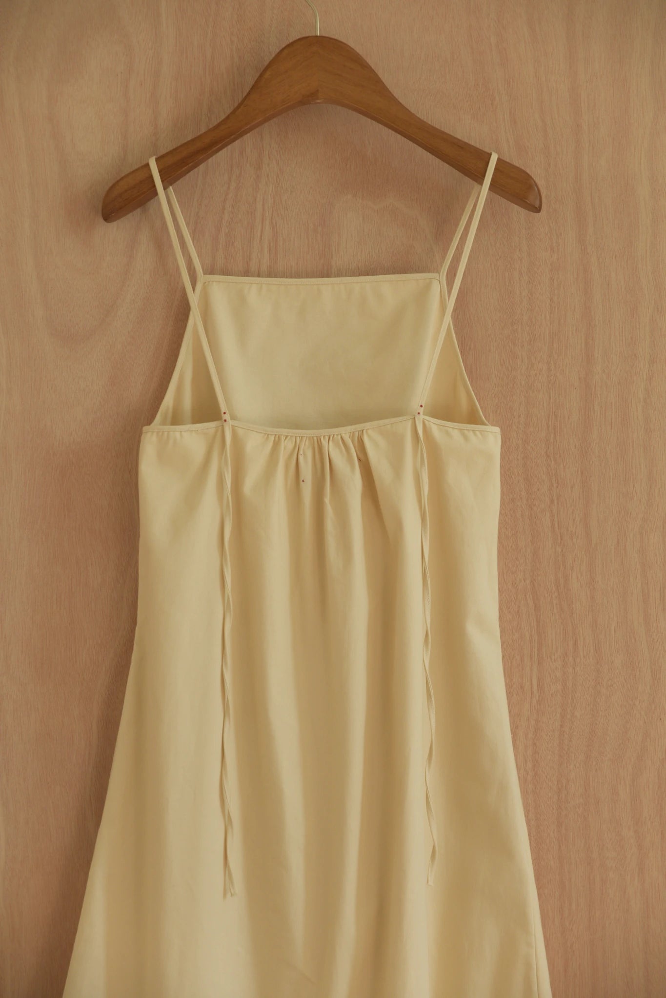 Detail showing matte fabric and top edge seam