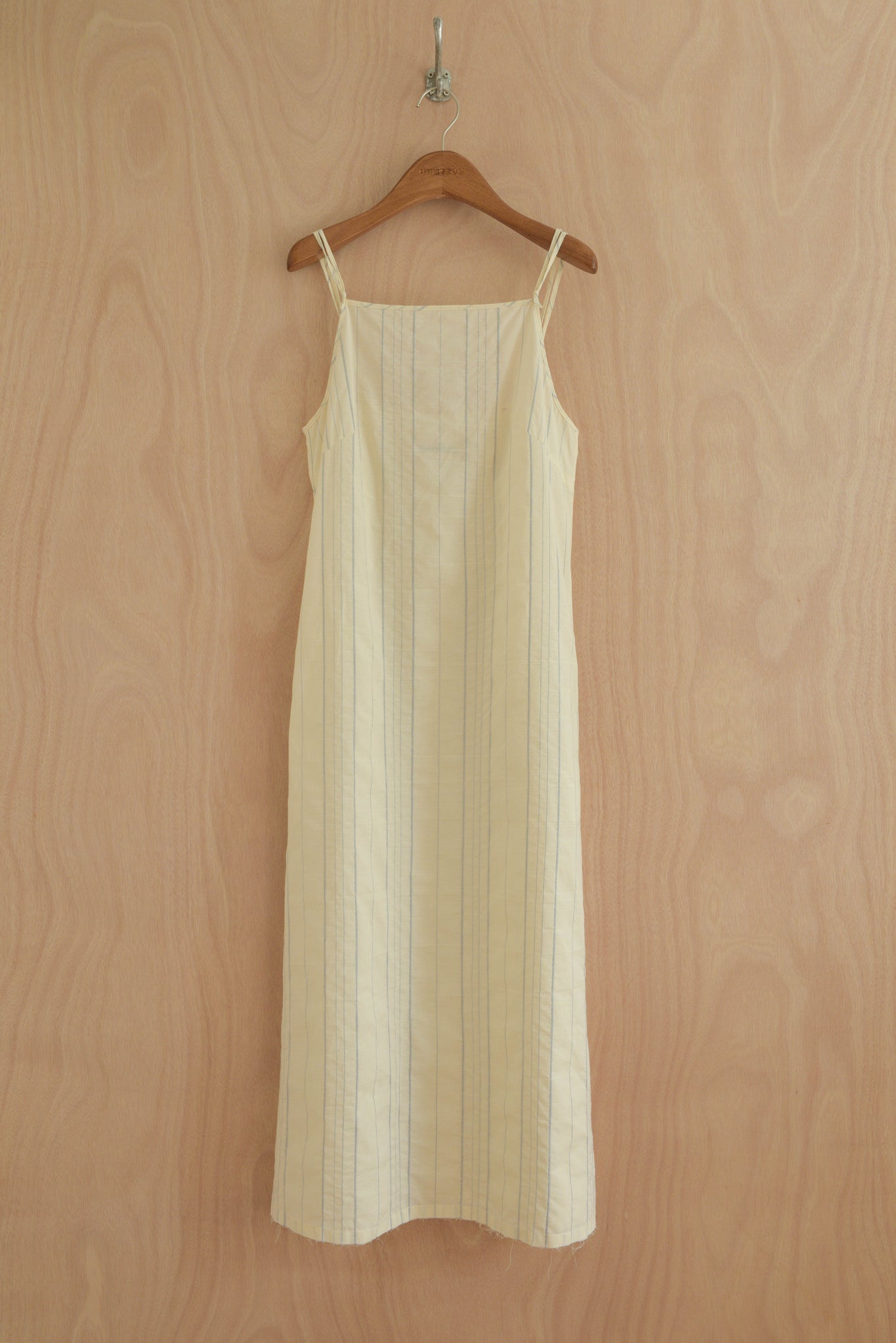 Front view of Paula Dress in cream organic cotton with straight cut and thin straps
