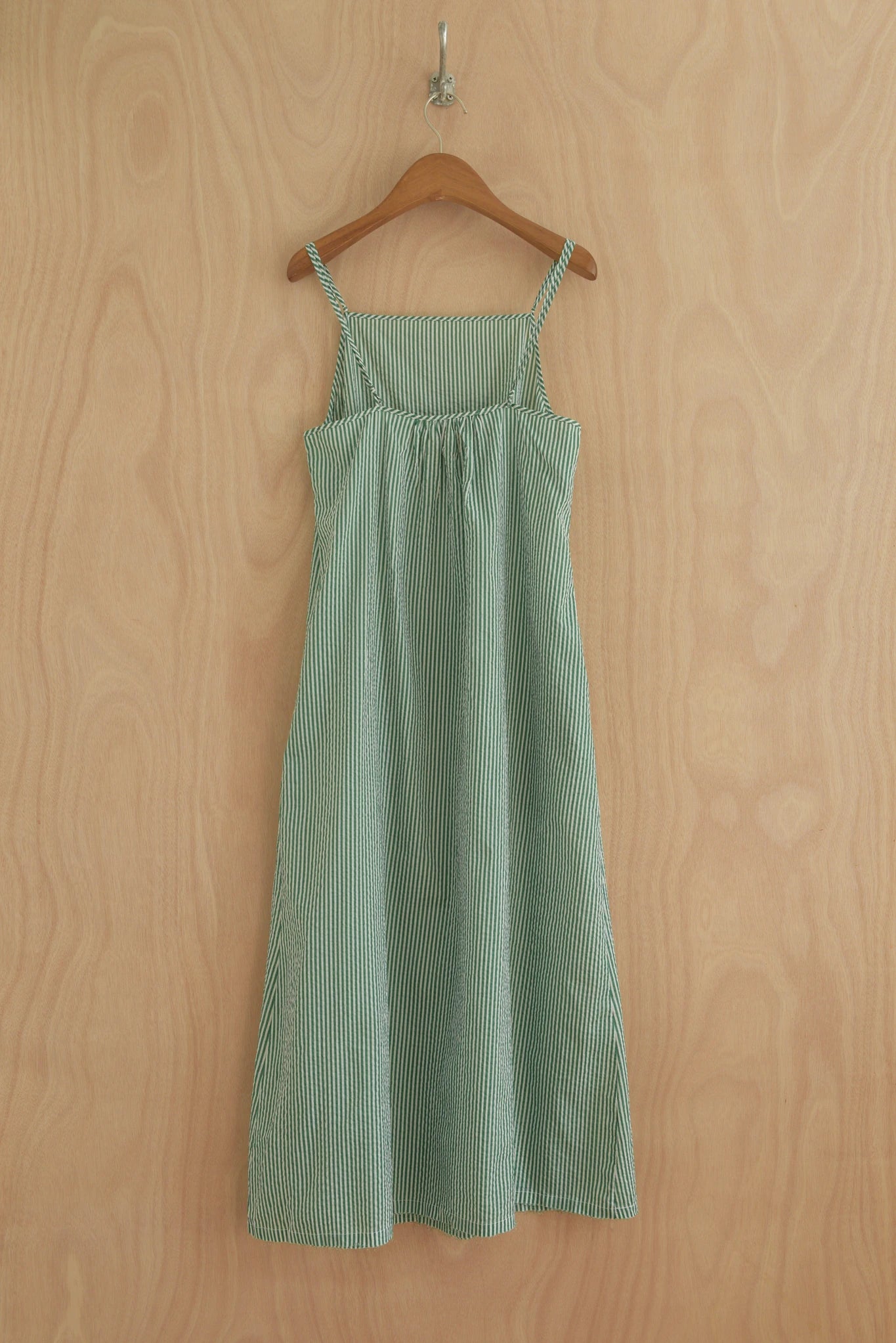 Back view of Paula Dress showing soft drape and square cut