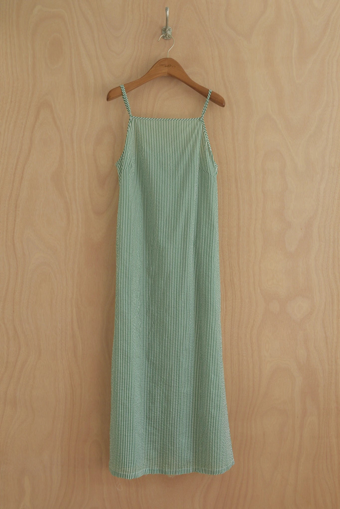 Front view of Paula Dress in green and white striped organic cotton with thin straps