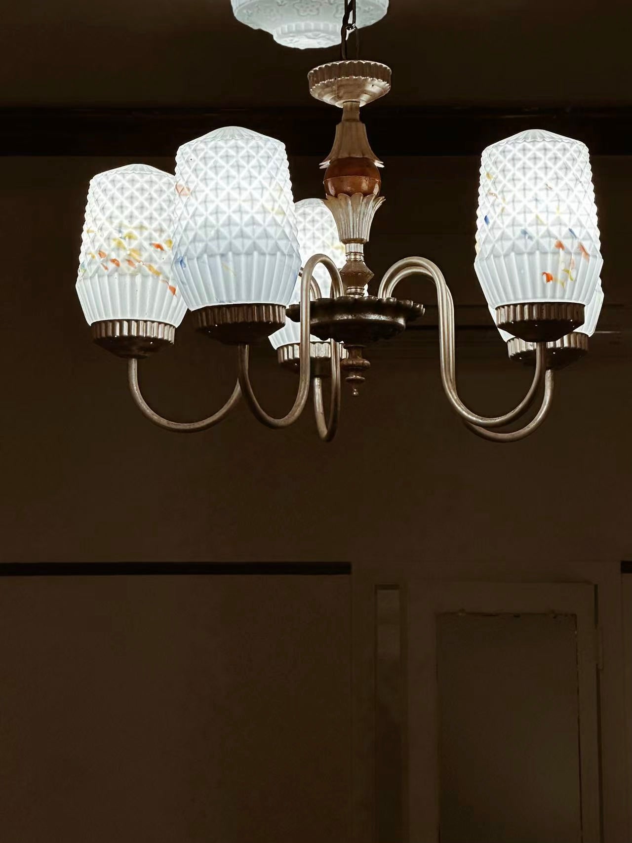 colored-glass lamps inside the UNISECON store