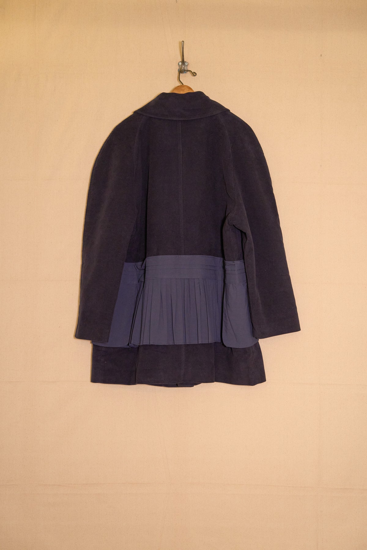 UNISECON Alba coat in blue back view