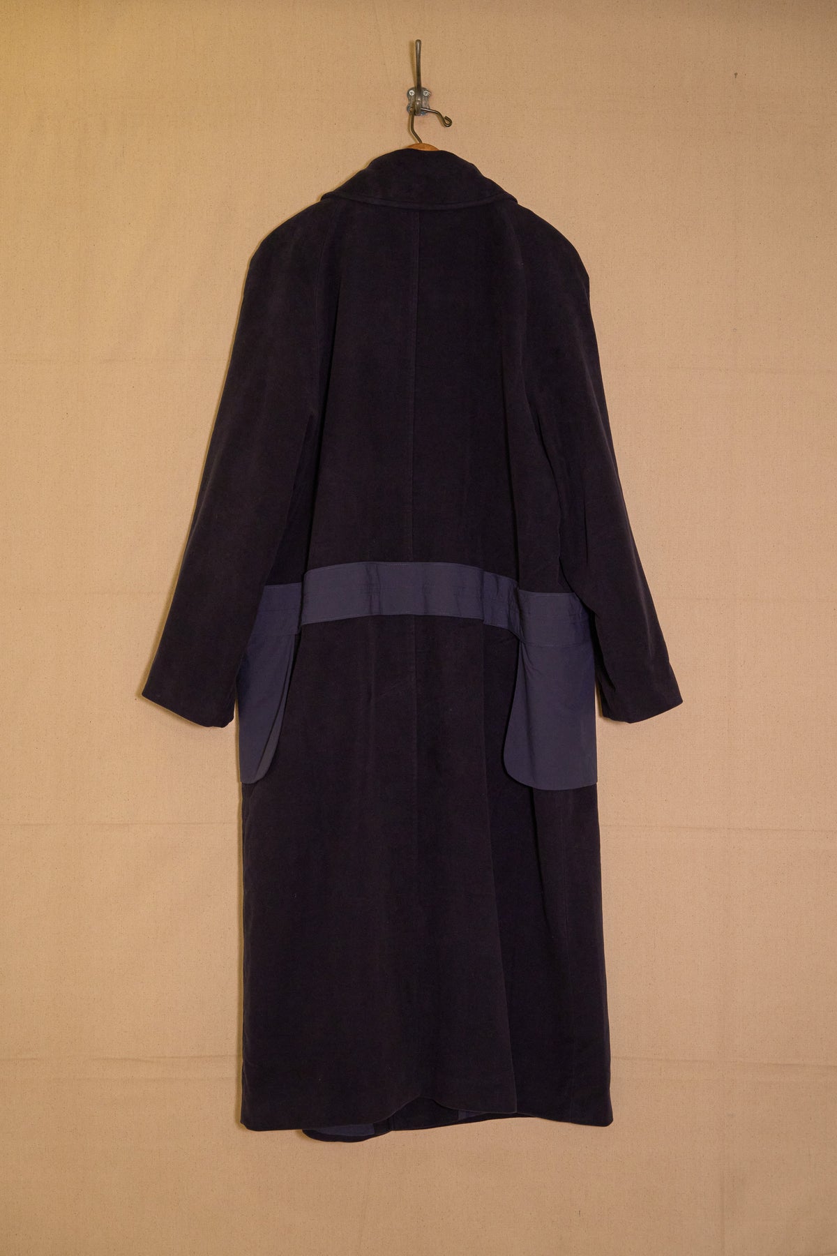 UNISECON Alma coat in blue back view