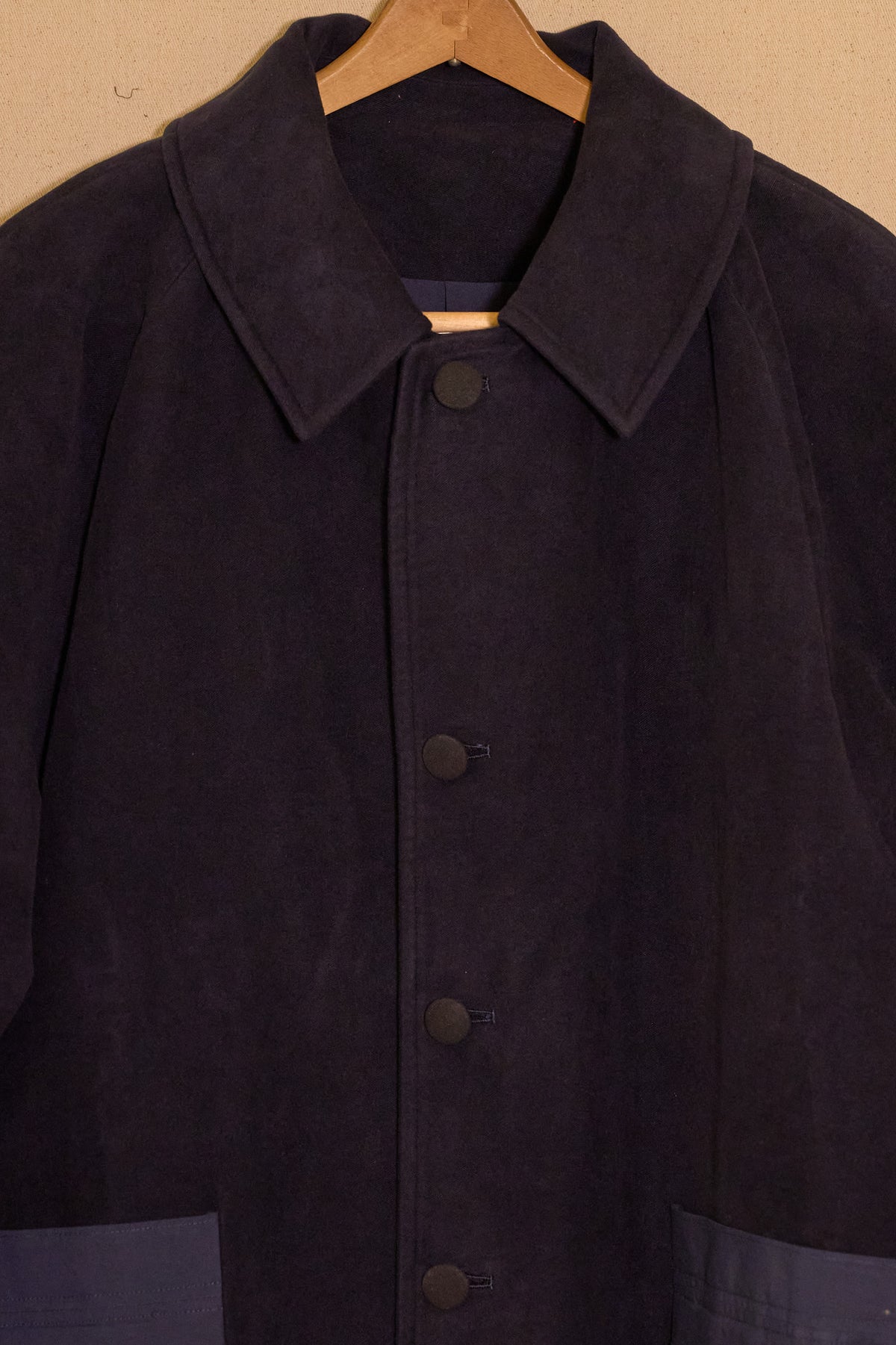 UNISECON Alma coat in blue detail view