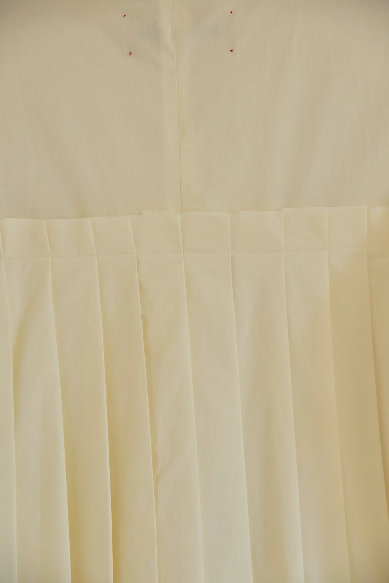 UNISECON Calen jacket in cream detail view