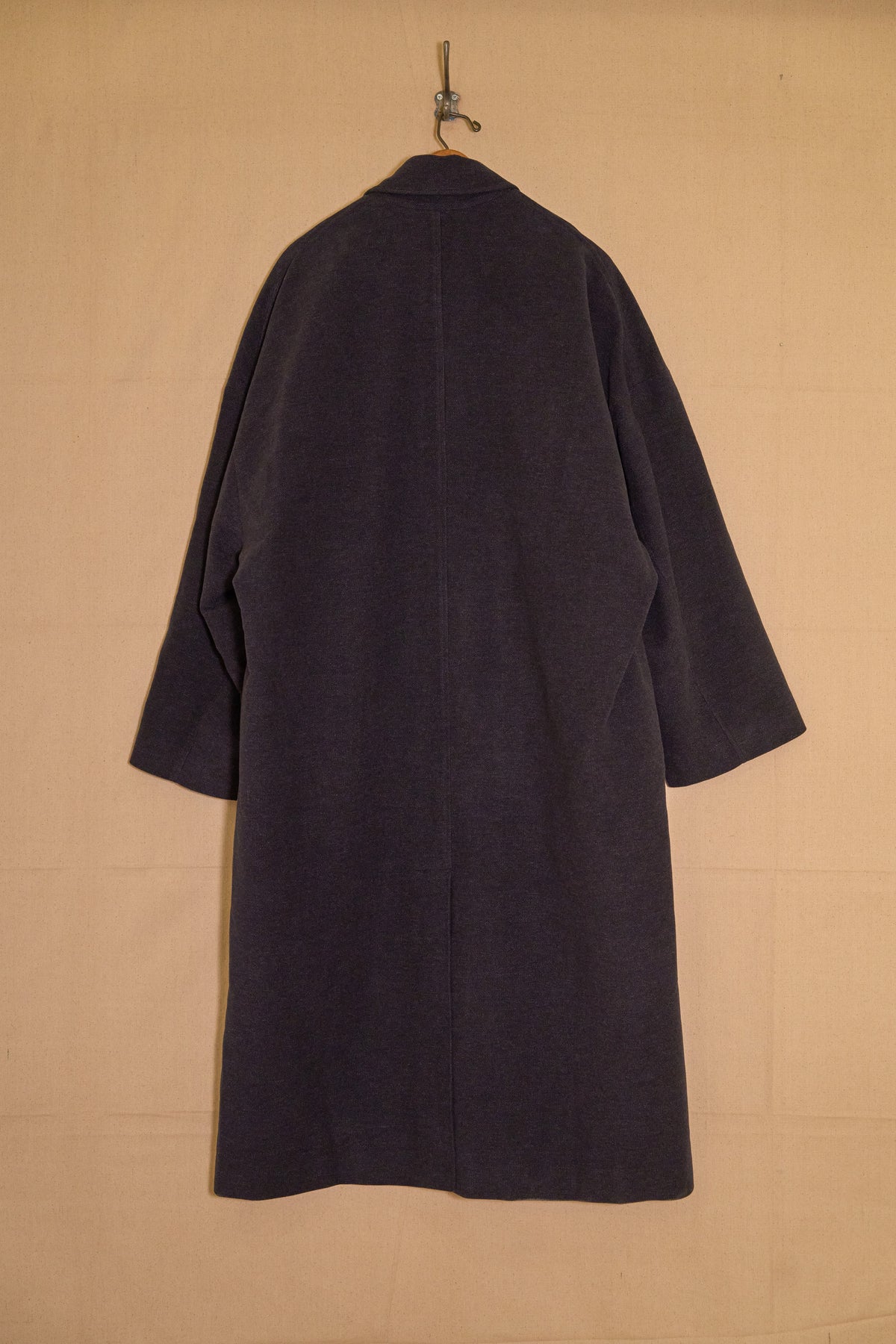UNISECON Cyrus coat in blue back view