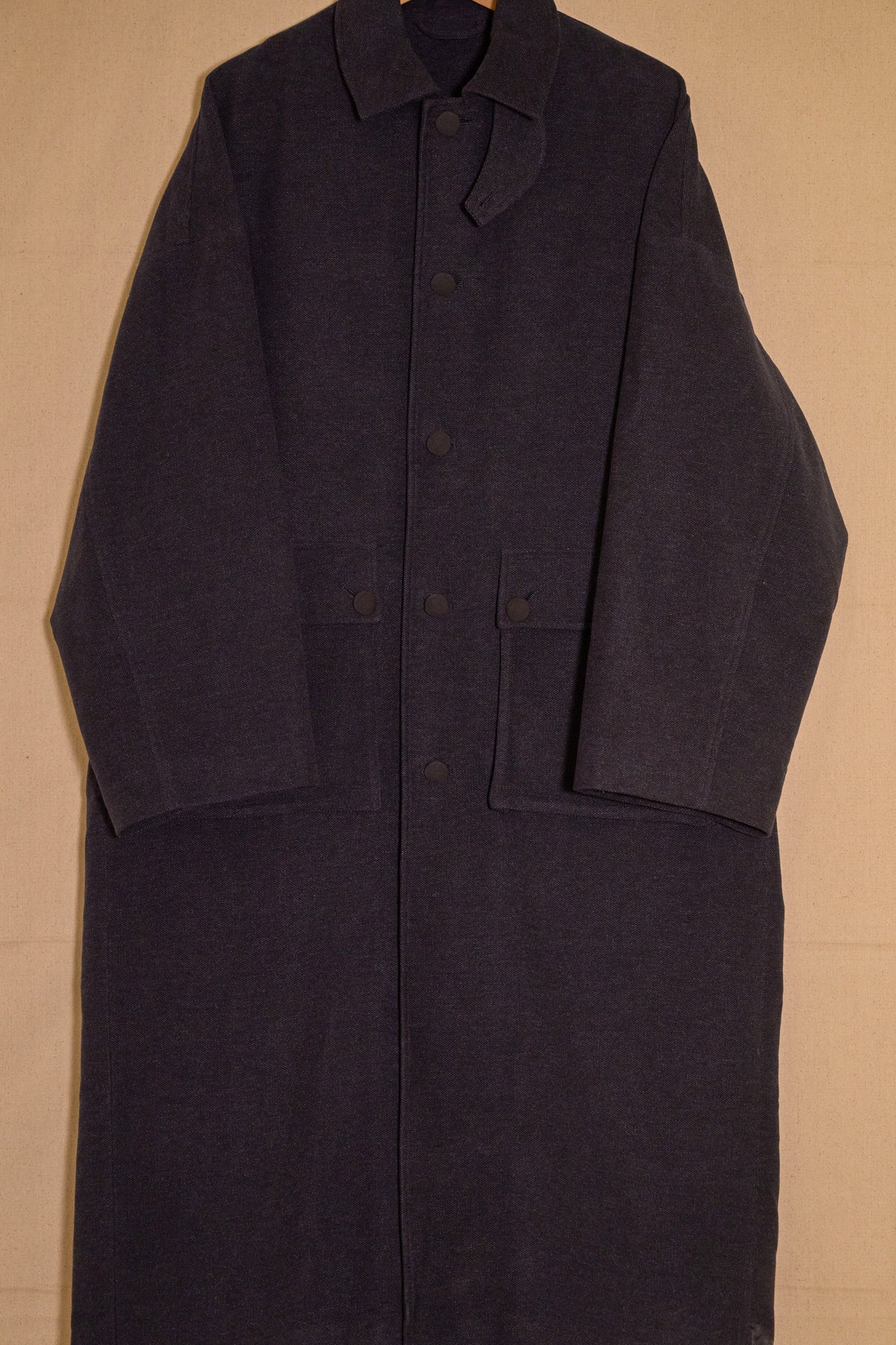 UNISECON Cyrus coat in blue detail view