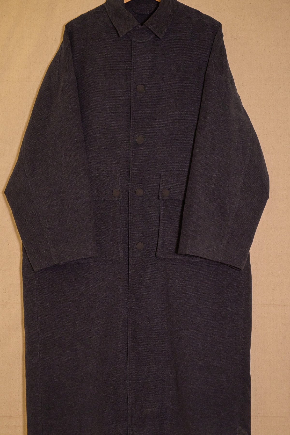 UNISECON Cyrus coat in blue detail view
