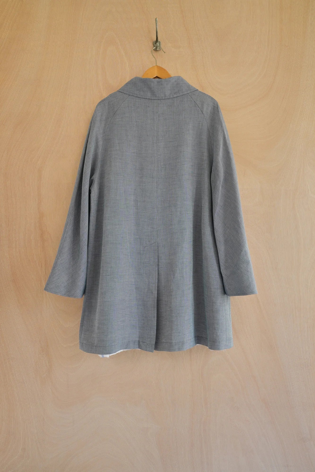 UNISECON Irma coat in blue, back view