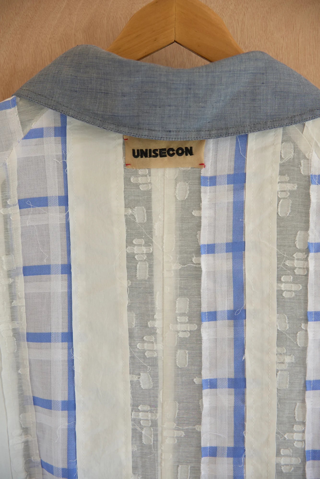 UNISECON Irma coat in blue, detail view