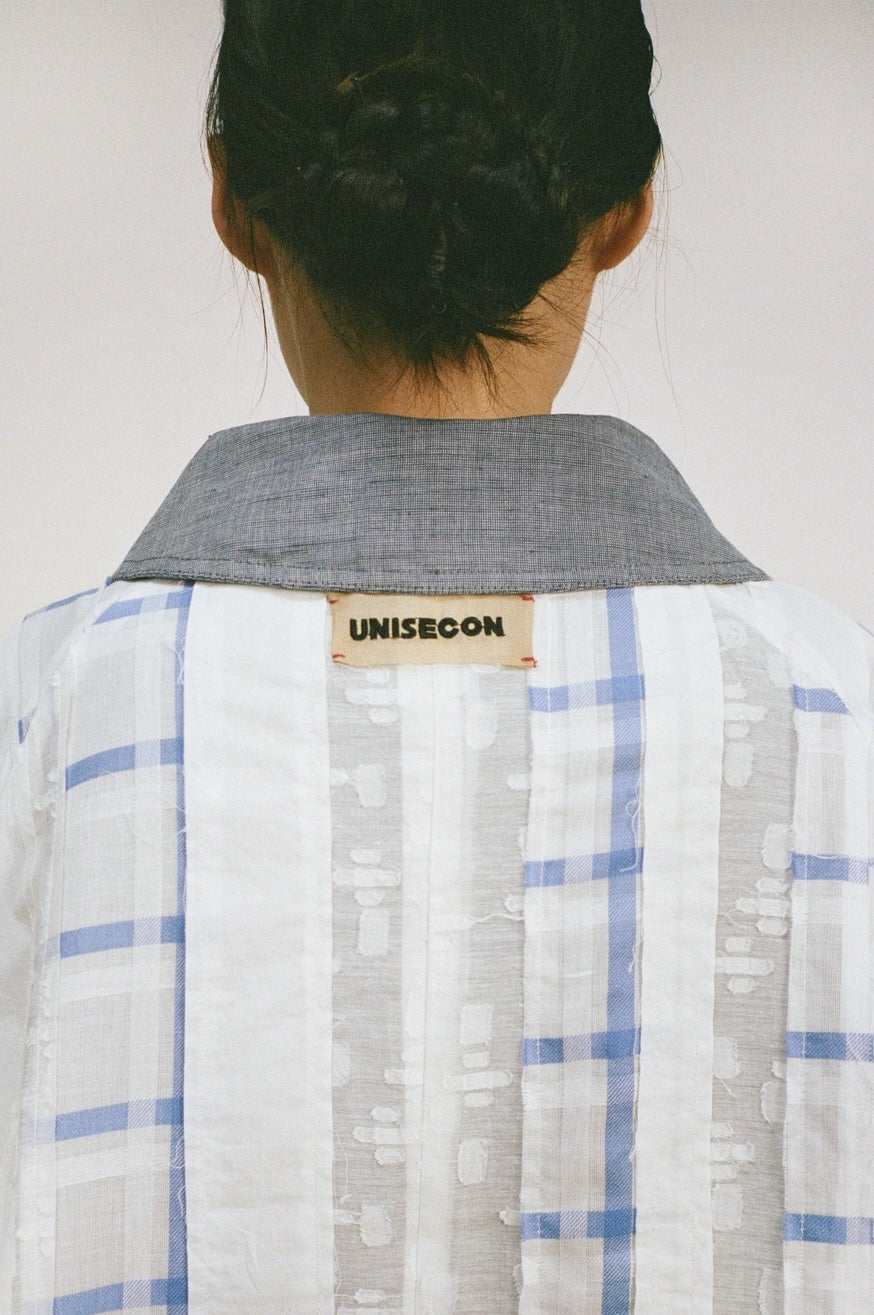 unisecon-irma-coat-white-blue-plaid-back-tag-detail