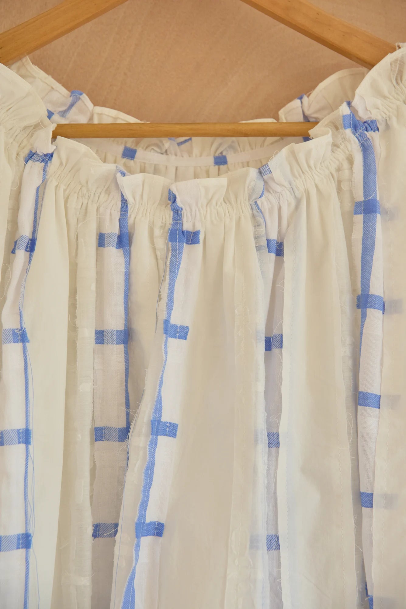 UNISECON Orr top in white/blue, detail view