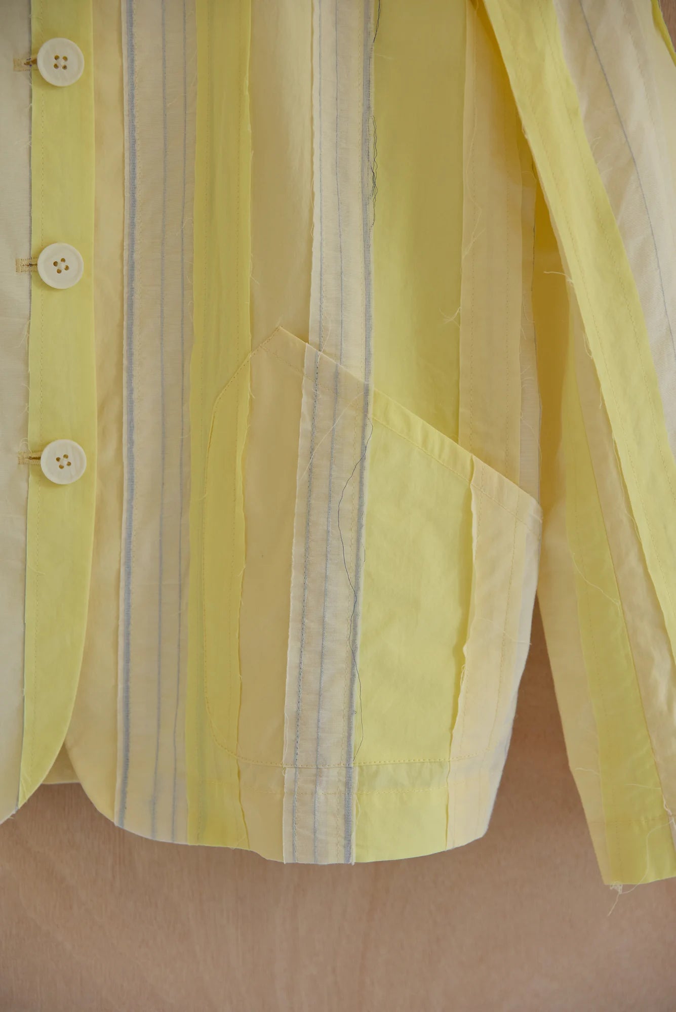 UNISECON Patcha jacket in yellow, detail view 01