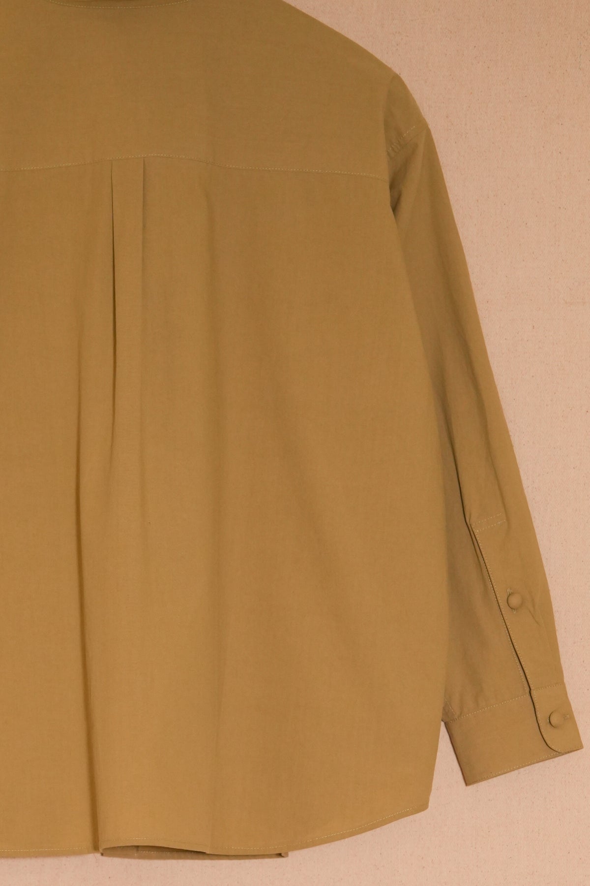 UNISECON Tyra top in chartreuse detail view