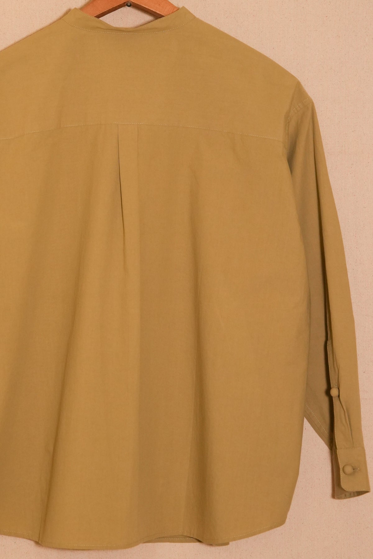 UNISECON Tyra top in chartreuse detail view