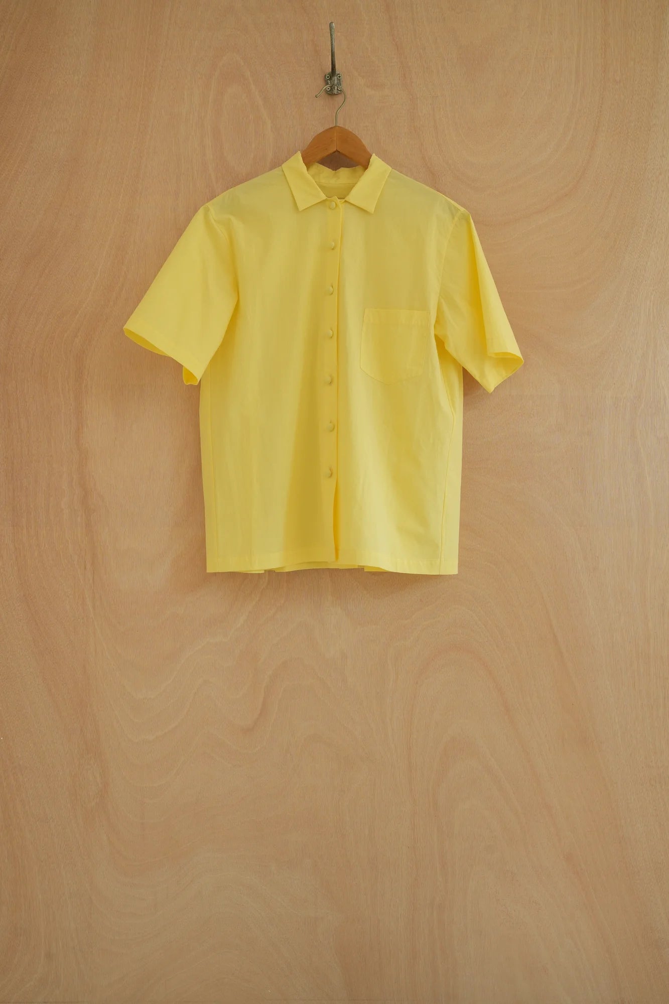 UNISECON Wei top in yellow, front view